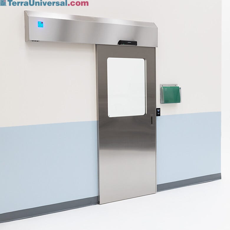 Partial view stainless steel automatic sliding door with touchless motion door pad  |  5556-13-LS displayed