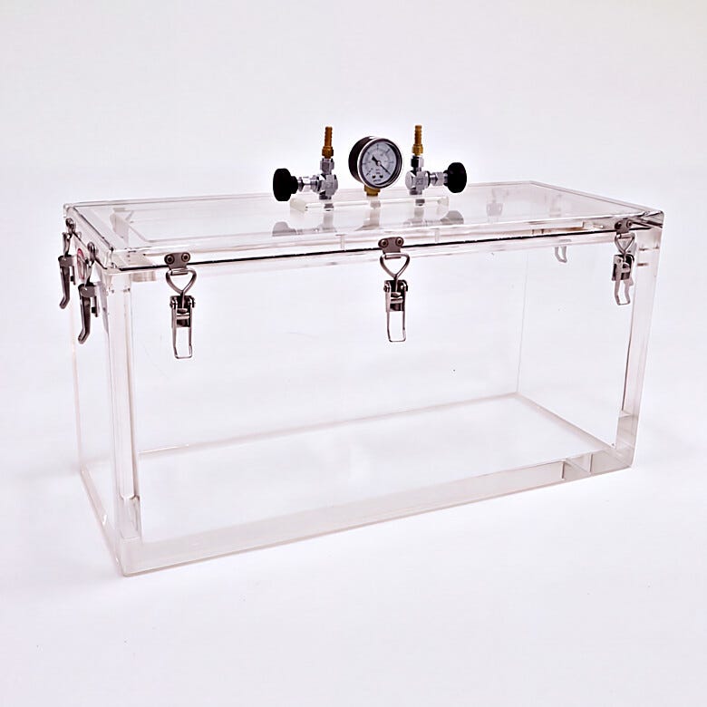Inch-thick acrylic chamber walls support vacuum to 29.9