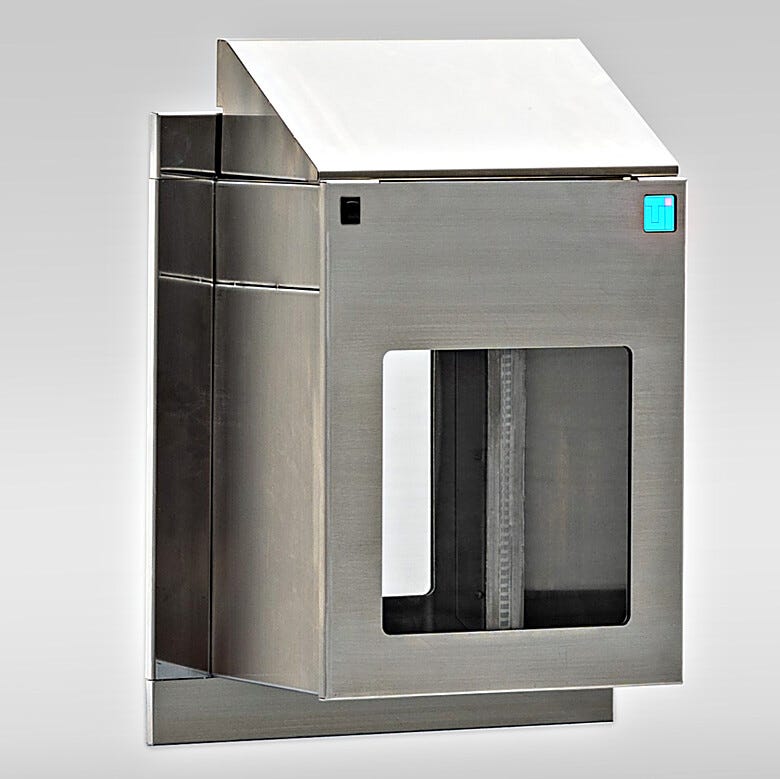 Wall-mount pass-through features a motorized sliding door on both sides of the stainless steel chamber, with sloping top  |  2629-00 displayed