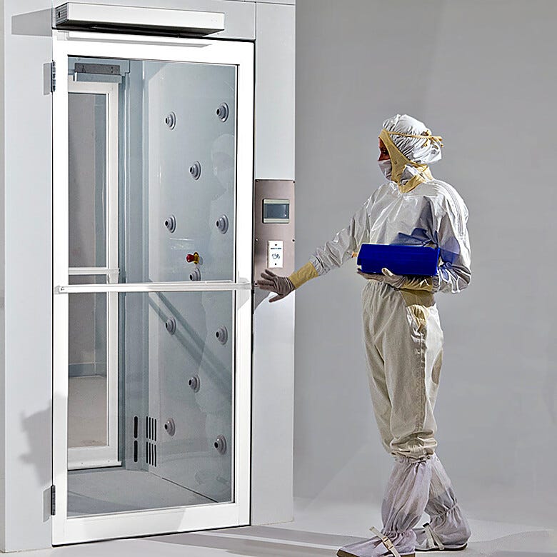 Powder-Coated Aluminum Automatic door opener with motion sensor allows hands-free door operation (shown installed above Air Shower entrance)