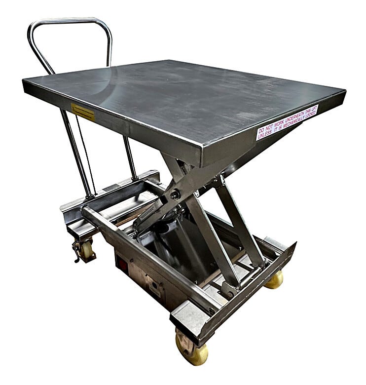 Stainless steel portable hydraulic lift table in raised position showing scissor mechanism, rectangular platform with safety labels, push handle, and mobile cas | 1735-08 displayed