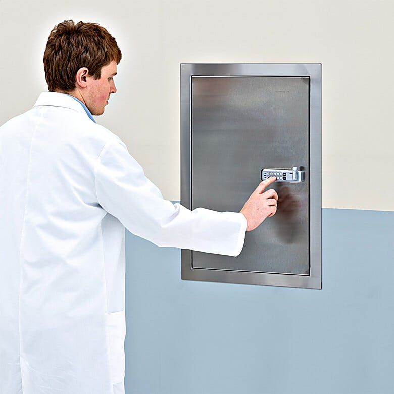 Wall-mounted storage cabinet constructed from 316L stainless steel with a combination lock providing controlled access  |  2633-89 displayed