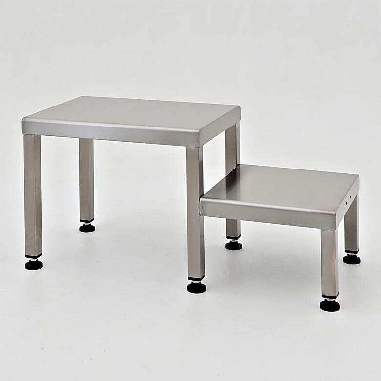 Two level gowning bench helps minimize unnecessary bending; ideal for cleanroom gowning procedures while sitting to put on or remove coveralls and footwear  |  1530-35A displayed
