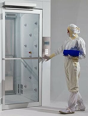 Automatic swing door with motion sensor allows hands-free door operation (shown installed on Air Shower)  |  