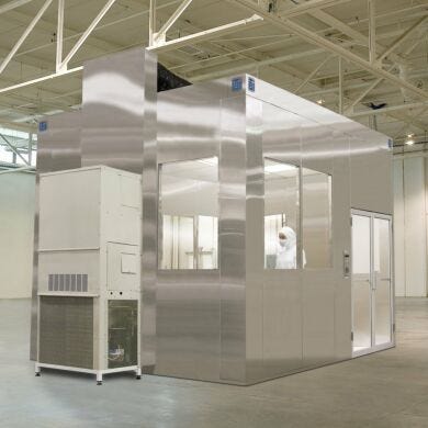 Air plenums can be added to all-steel BioSafe cleanrooms and ducted directly back into the fan/filter units (shown with integrated air conditioning unit)