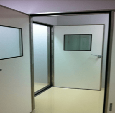Hygienic Manual GRP Hermetic Sealing Hinged Doors with a smooth gelcoat and stainless steel surround ideal in pharma and healthcare environments  |  