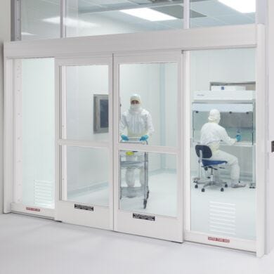 Automatic sliding doors provide cleanroom-compliant operation for use in research, healthcare and educational labs