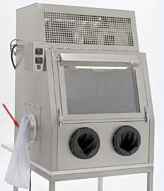 Waste bags, shown on the left side of this glovebox.  |  1694-44 displayed