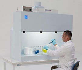 Shown: Polypropylene Containment Hood with fan/filter unit (sold separately), installed on optional work surface  |  2101-21 displayed