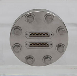 Multpin feedthru installed in acrylic vacuum chamber.  |  5235-46 displayed