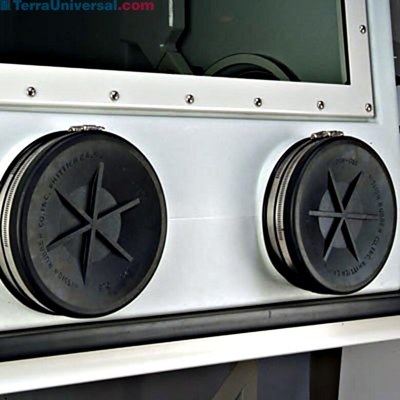 Shown are exterior glove port covers placed over gloveports on a Labconco glovebox. | 3643-51 displayed