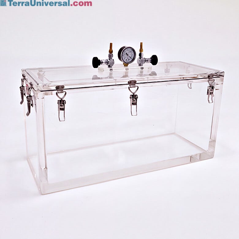 Inch-thick acrylic chamber walls support vacuum to 29.9