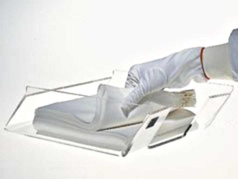Acrylic Cleanroom Wipe Dispenser with an angled design facilitates easy access to single-sheet wiper removal even by gloved hands  |  4950-93 displayed
