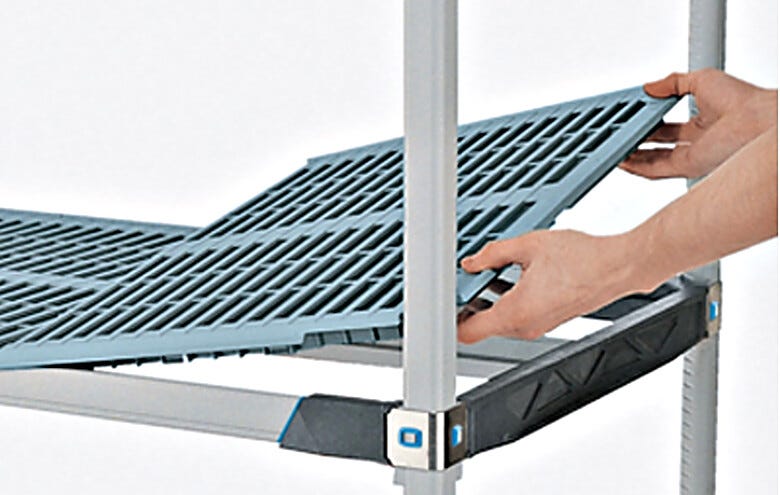 InterMetro Open Grid Interchangeable Polymer Shelving shown being assembled | 1541-15 displayed