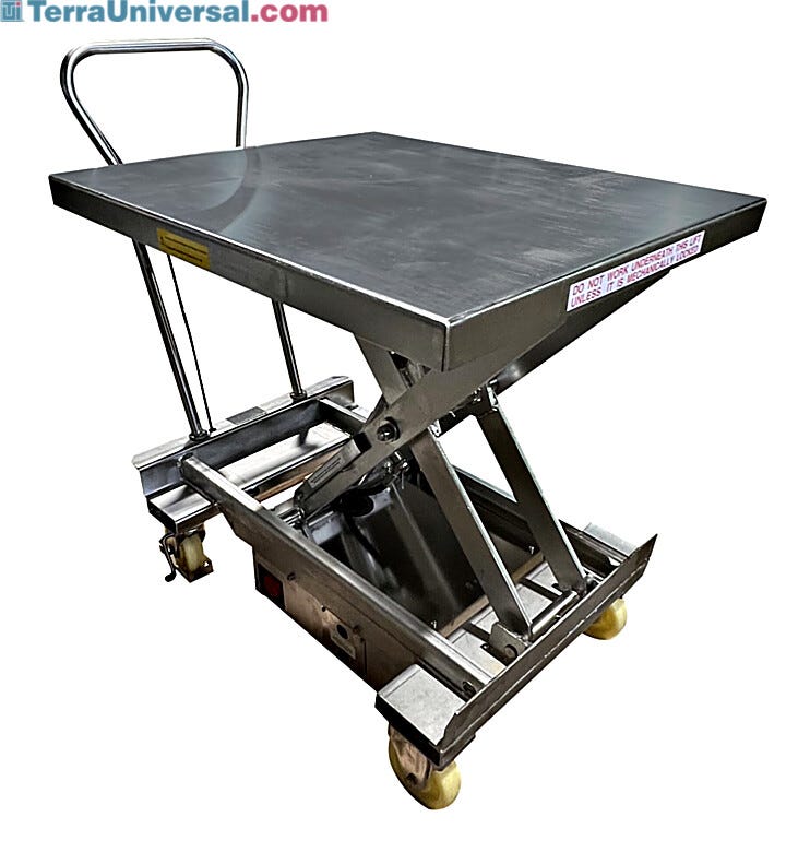 Stainless steel portable hydraulic lift table in raised position showing scissor mechanism, rectangular platform with safety labels, push handle, and mobile cas | 1735-08 displayed