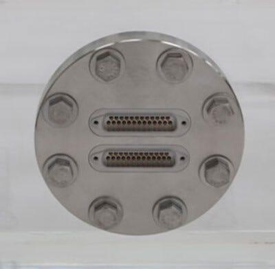 Multpin feedthru installed in acrylic vacuum chamber.  |  5235-46 displayed